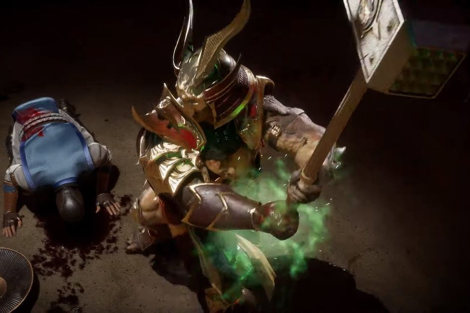 Picture of Shao Kahn performing a fatality in Mortal Kombat 11