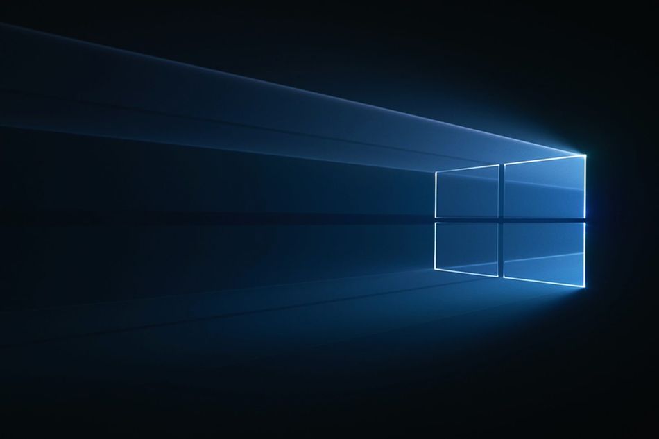 Windows 10 logo on a dark background.