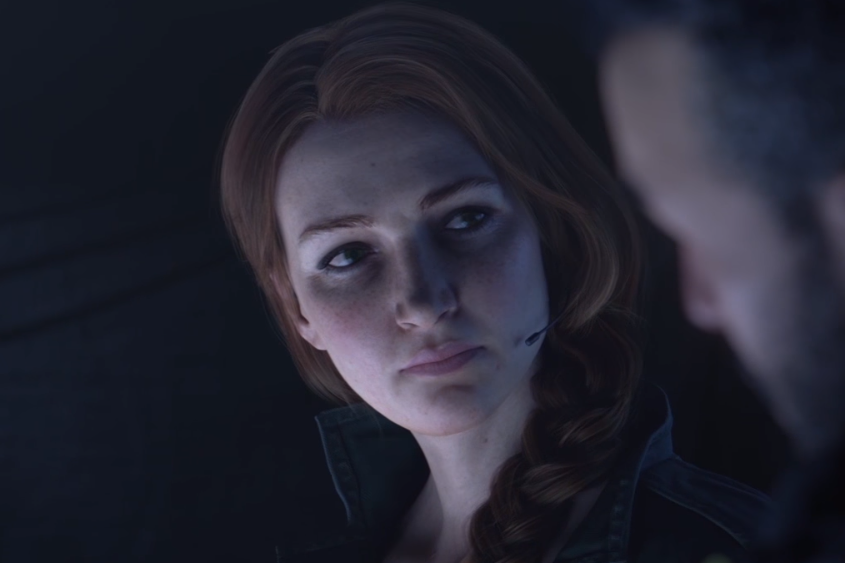 Face reveal for Ash, one of Rainbow Six Siege operatives in a rather dark ambient.