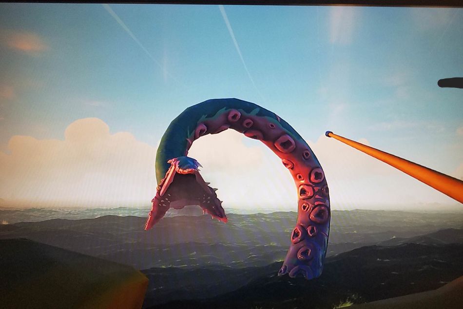 Kraken is attacking a ship in Sea of Thieves.
