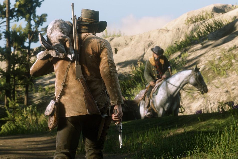 picture showing a cowboy with a dead rabbit