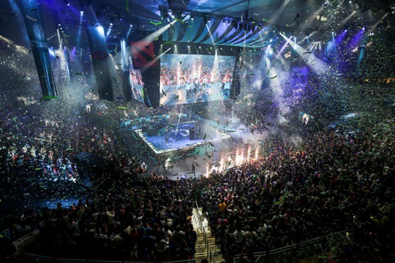Photo of Dota 2 finals in Seattle's key arena with a massive crowd