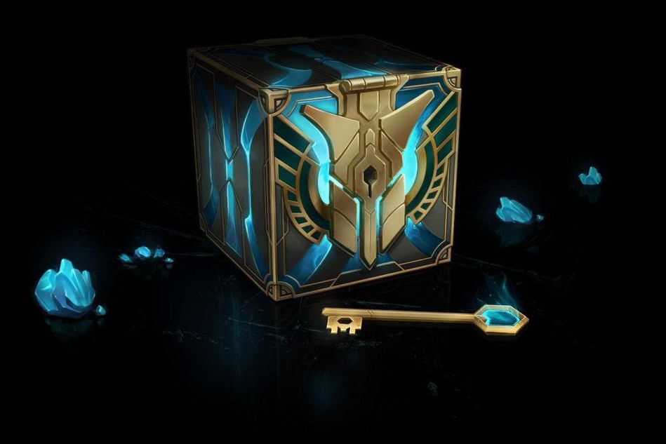 A picture of a blue/gold Hextech Chest and Key set from League of Lgends. Basically a fancy name for loot boxes.