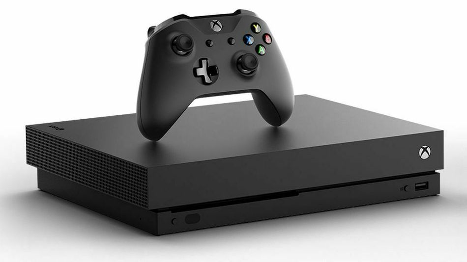 Xbox One X console with controller