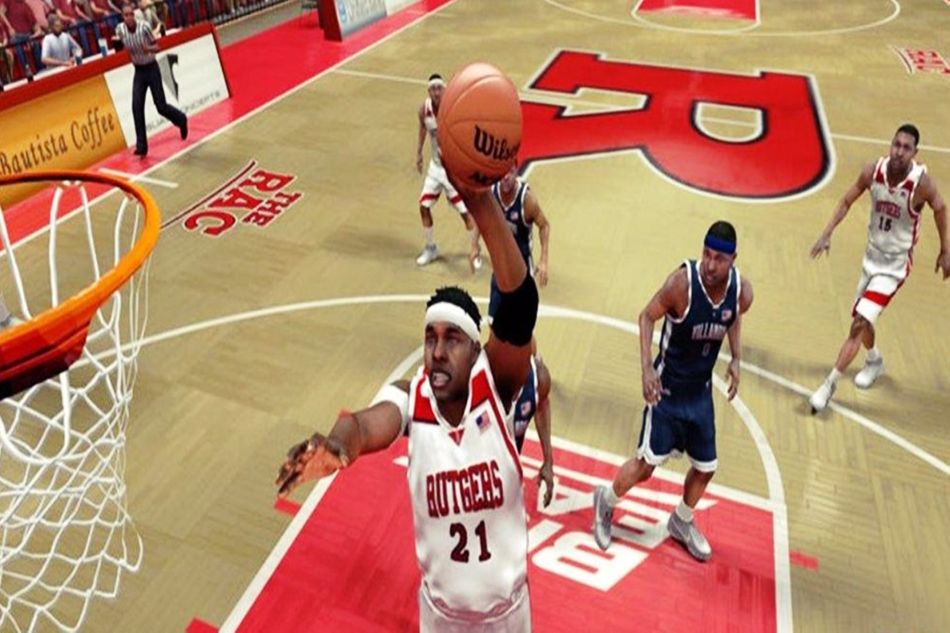 Screenshot of a player going for a dunk in College Hoops 2K8.