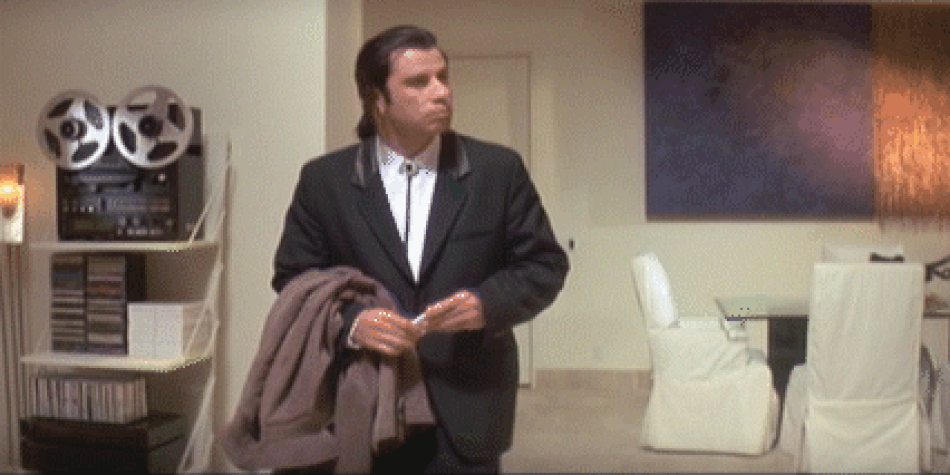 Vincent Vega looking around confused