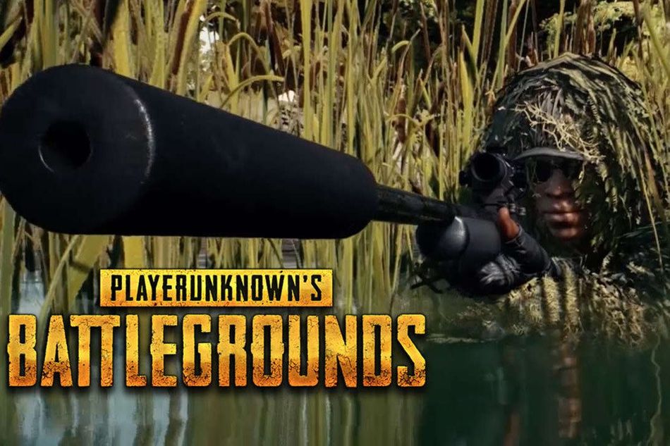 PUBG sniper in a ghillie suit is camping in a swampy area.