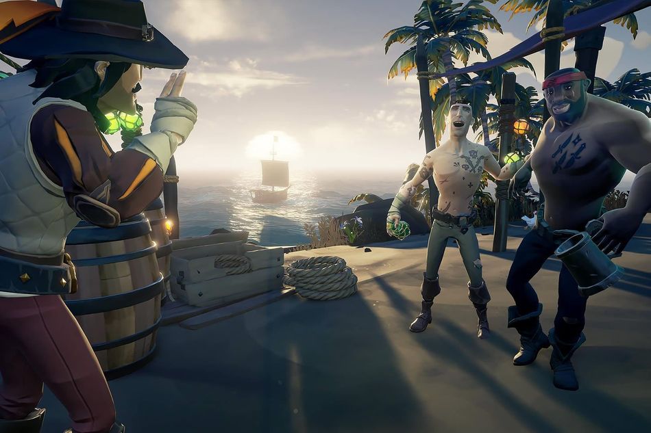 Three pirates standing around in Rare's game Sea of Thieves