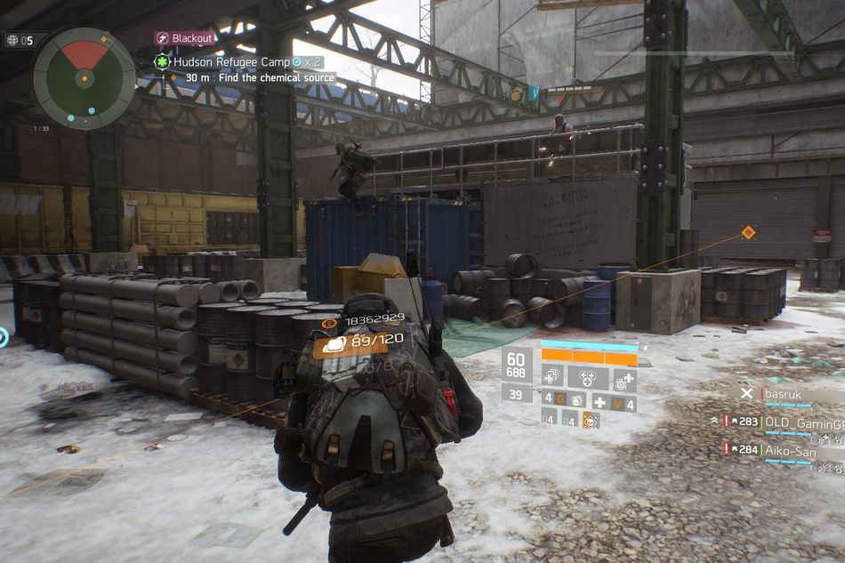Players are going through the Hudson Refugee Camp mission in The Division.