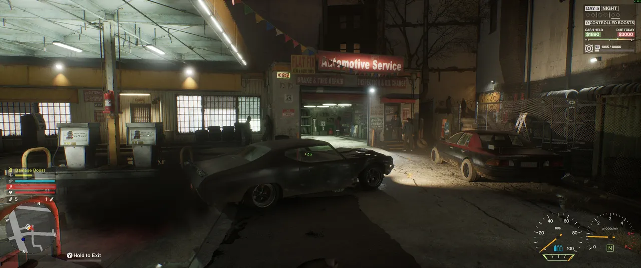 The Automotive Service sign marks the garage entrance. Drive up to the door and it will open on its own. Pull inside to get the repair started
