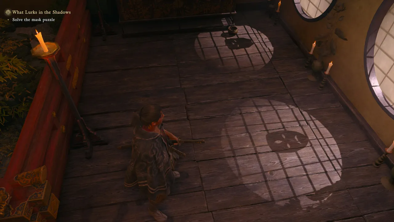 Step outside to see the shadows properly. Each one carries a distinct number of holes that maps back to a hanging mask.