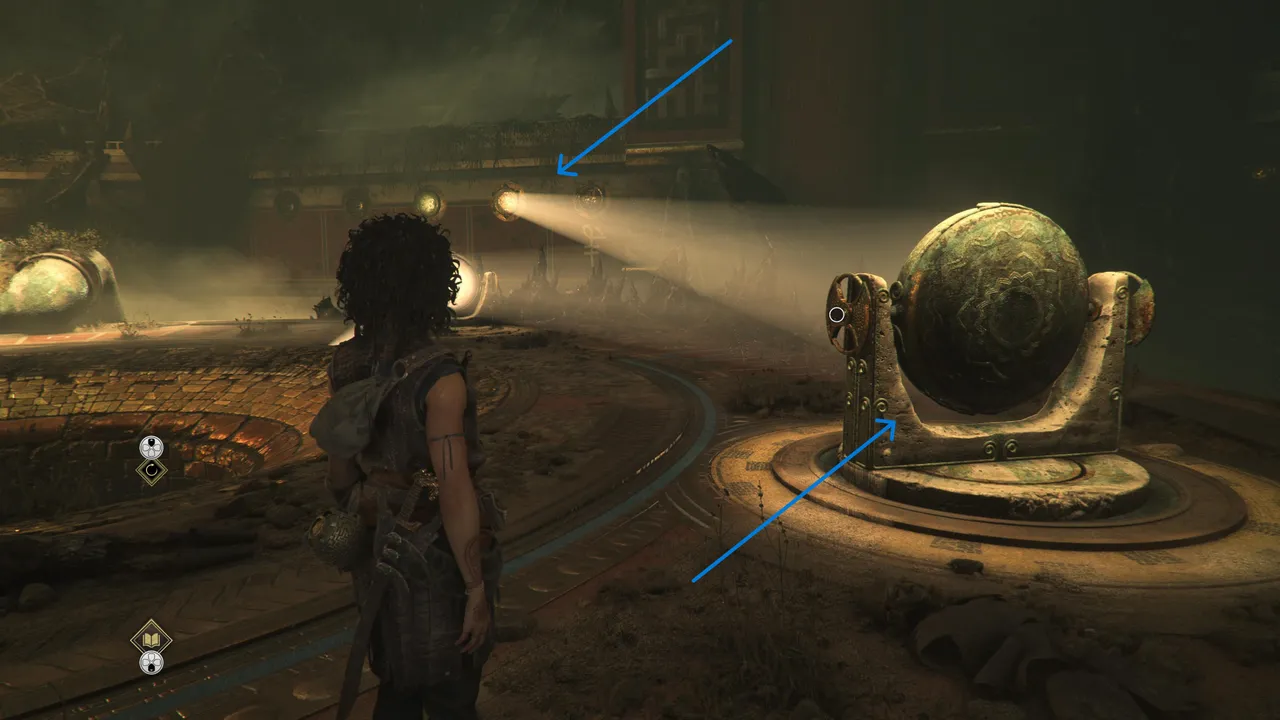 After bouncing the light to the lens in the middle, point it towards where the symbol is.