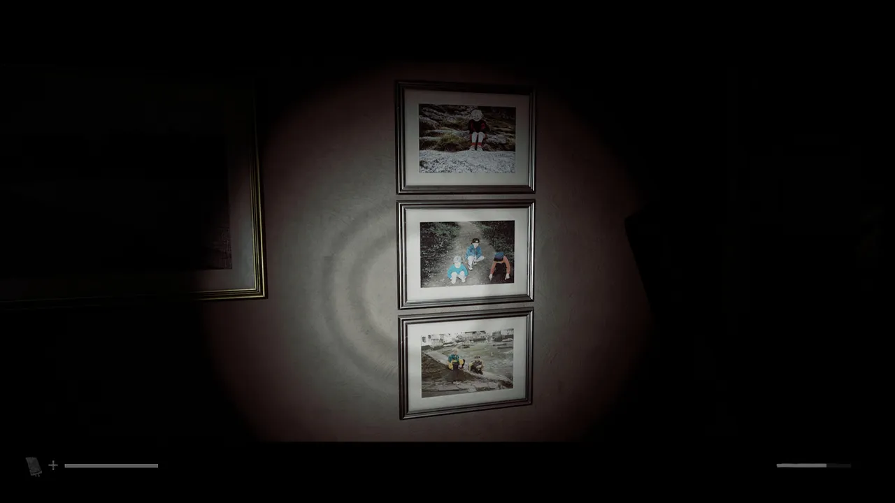 The three framed photographs in the kitchen, showing six children between them.