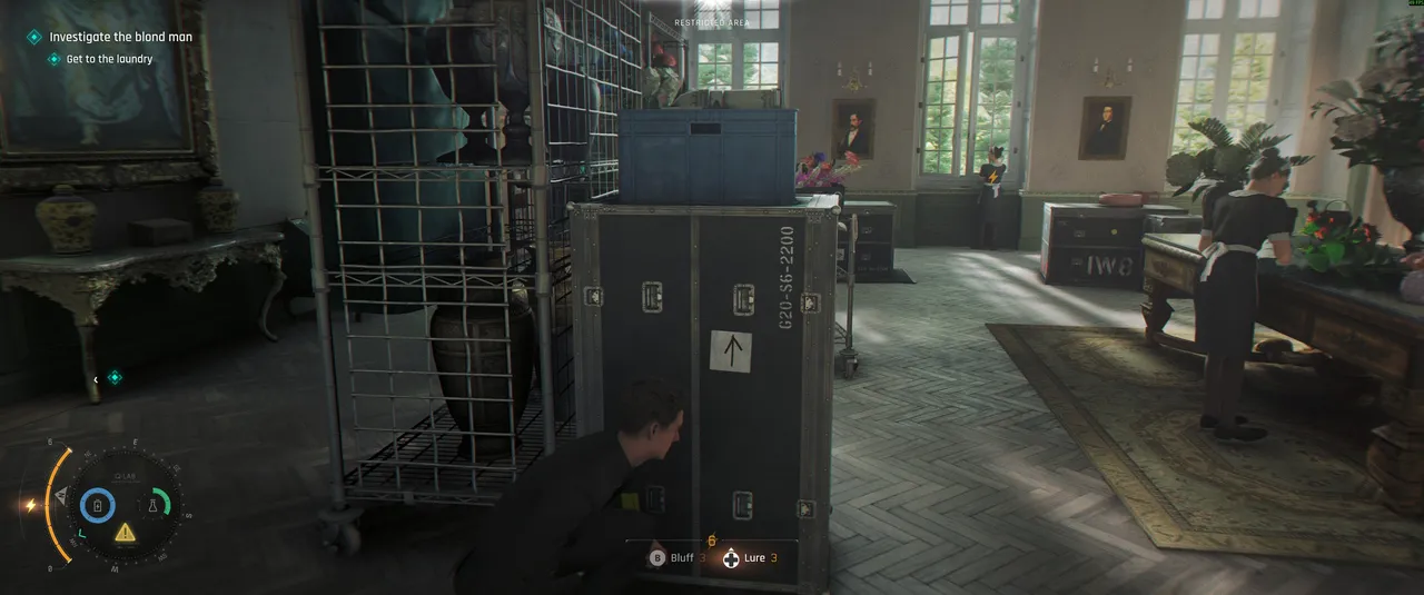 The maid room is the easier of the two routes into the manager's office. Use your gadgets to distract the maids and move through without being spotted.