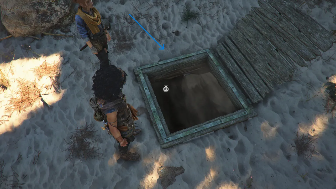 Behind the masthead, you'll find a hidden trapdoor buried under the sand.