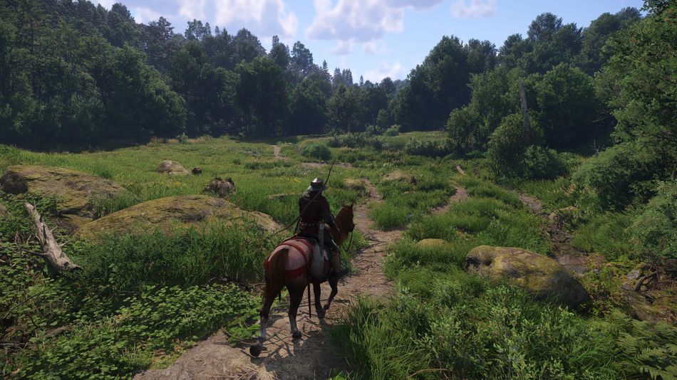 Kingdom Come Deliverance 2 screenshot showing a man riding a horse