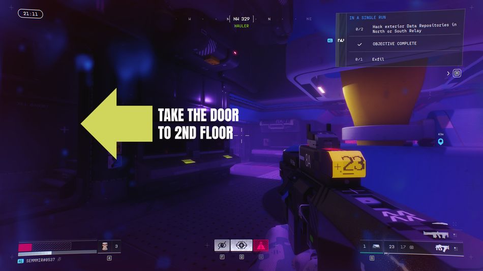 Once in the large central room, go left and take the door up to the second floor - the target room is straight ahead.